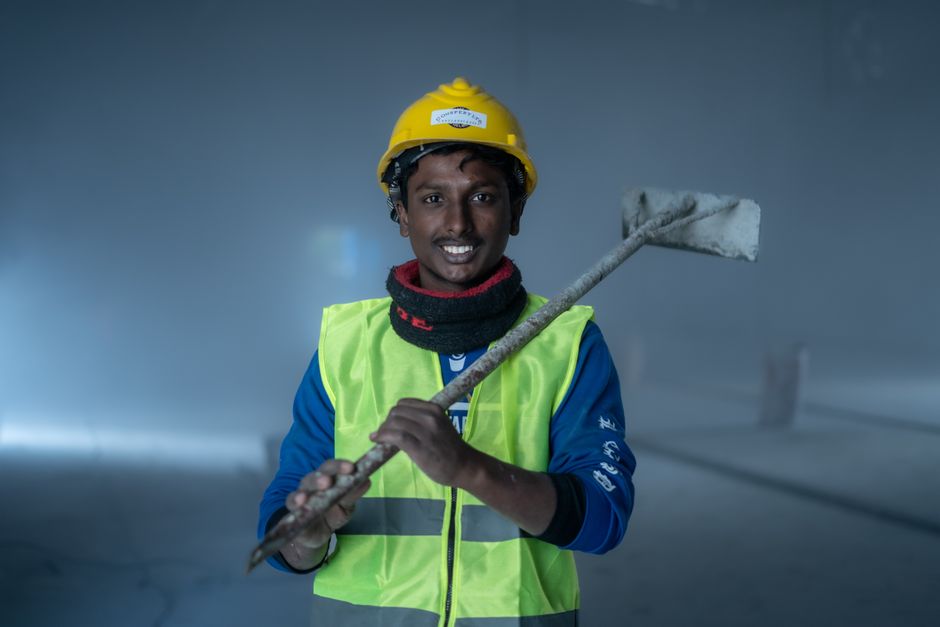 Friendly window installation expert smiling