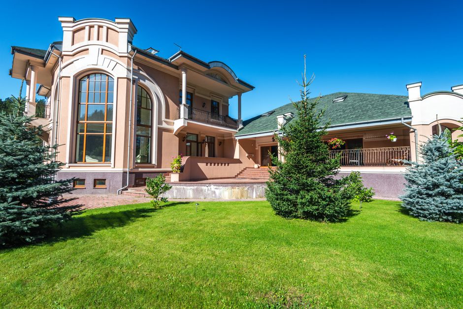 Modern home exterior showcasing beautiful new replacement windows